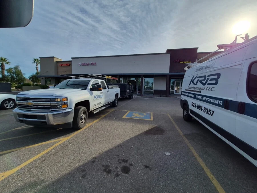 KRB Development vehicles at a commercial construction site